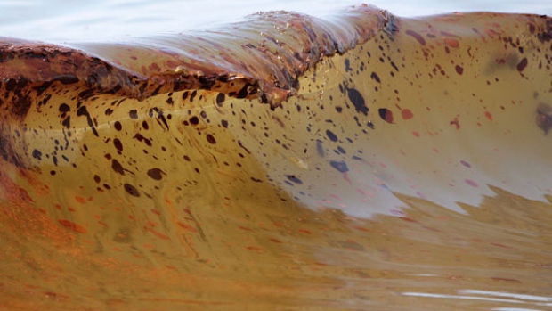 Crude oil from the Deepwater Horizon oil spill washes ashore in Orange Beach, Ala., on June 12, 2010.