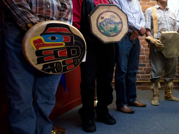First Nations chiefs hold drums while listening during a news conference in Vancouver, B.C., after the Supreme Court of Canada ruled in favour of the Tsilhqot'in First Nation, granting it land title to 438,000-hectares of land on Thursday June 26, 2014. 