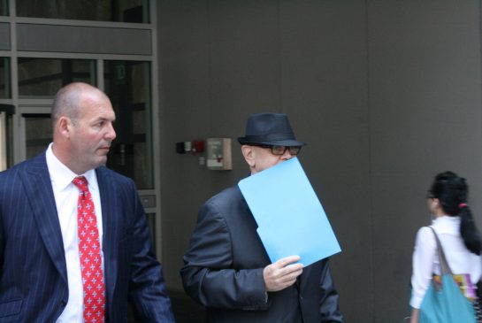 Alfred "Budd" Johnston, leaving a 2014 hearing into complaints of misconduct against him.