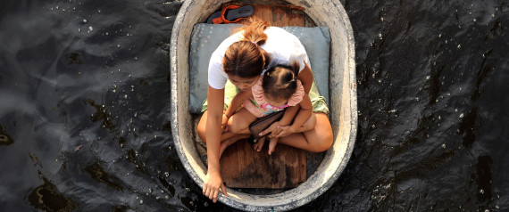 CLIMATE CHANGE FLOODED WOMAN